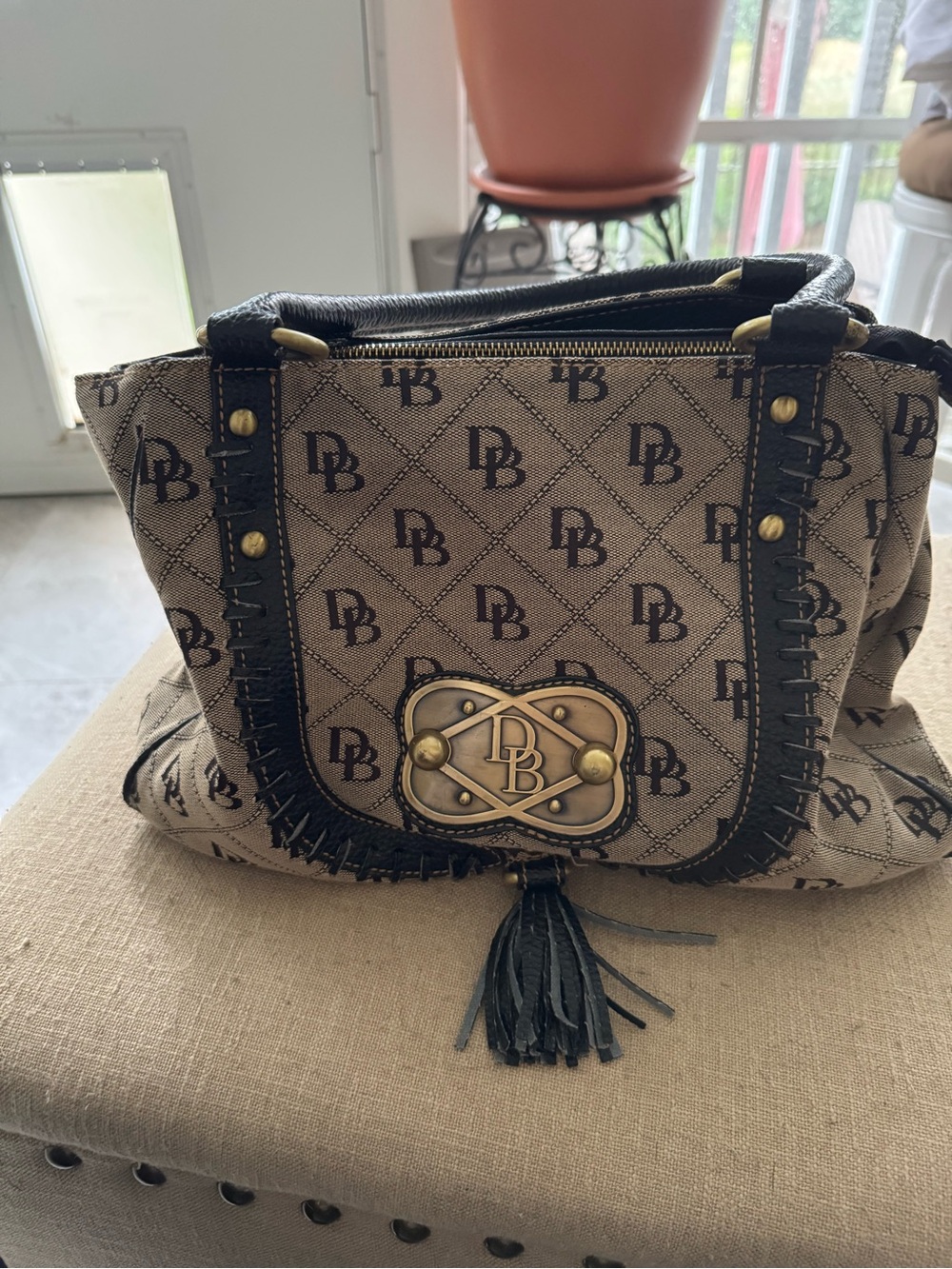 Dooney & Bourke Tan and Black Signature Satchel with Tassel